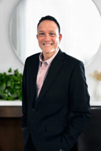 Headshot of Adam Burhman, Chief Growth Officer at AdCellerant