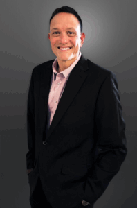 Professional headshot of Adam Burnham, Chief Growth Officer at AdCellerant