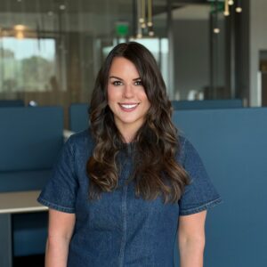 Professional headshot of Jenna Herrig, Sr. Partner Success Manager at AdCellerant.