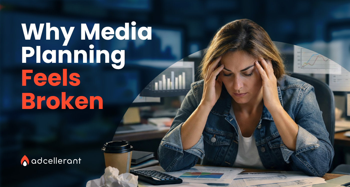 A frustrated marketing professional sitting at a desk surrounded by charts and media plans, illustrating why the traditional media planning process feels broken for local advertisers.